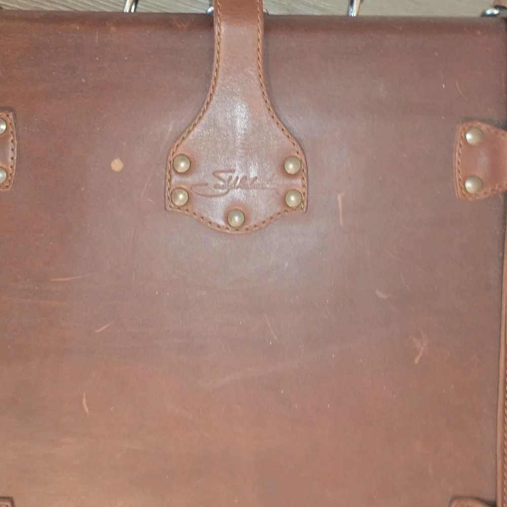 2015 Saddleback Leather Suitcase (hard sided, well traveled)